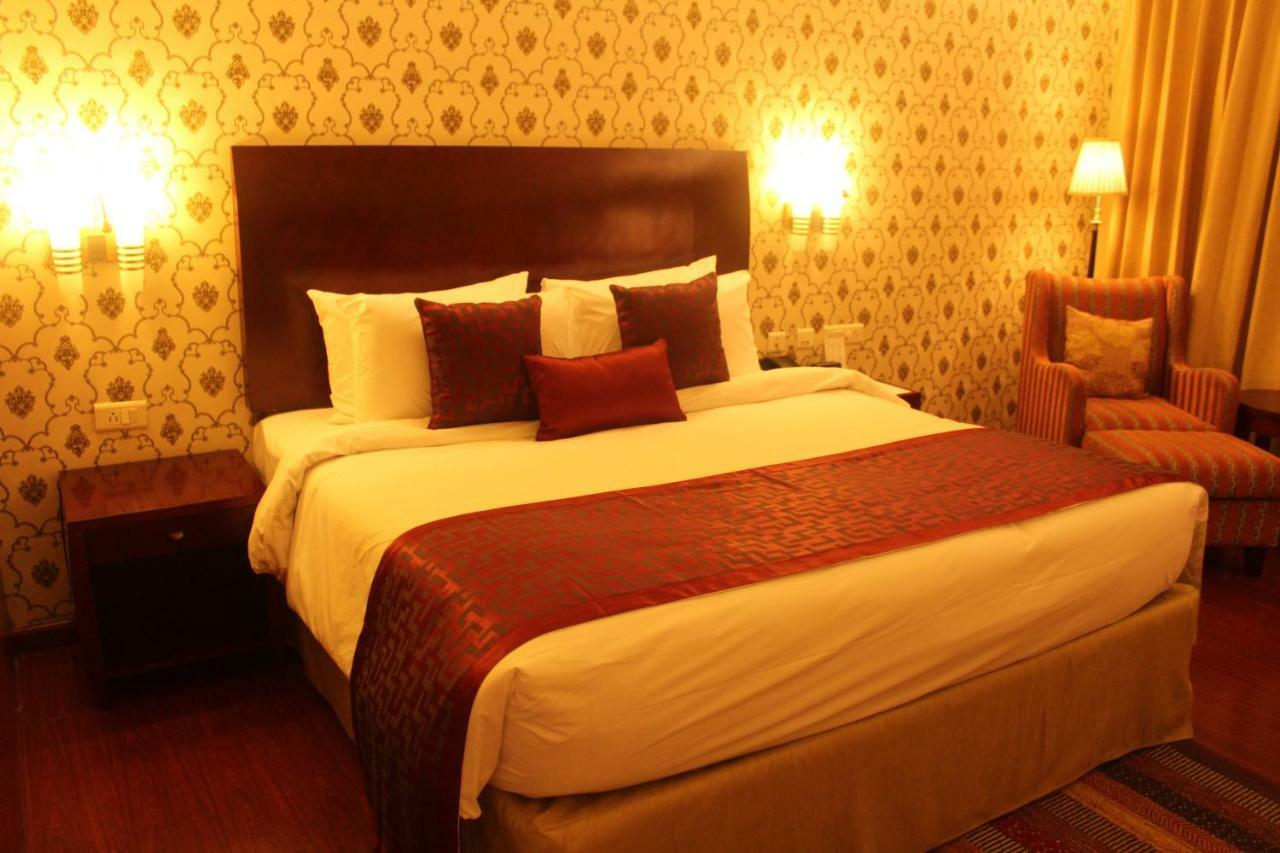 Hotel Ramada By Wyndham Jaipur Jaisinghpura Extérieur photo